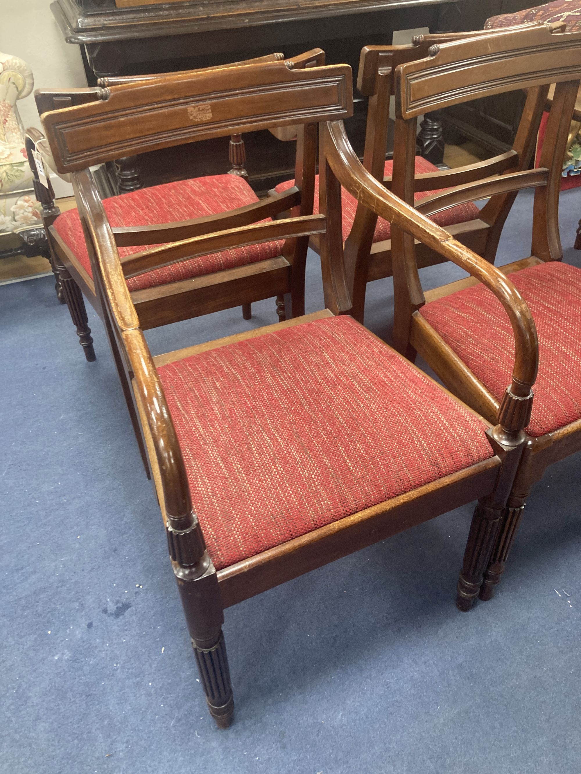 A set of eight Regency style mahogany dining chairs (two with arms)